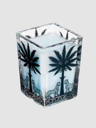Square glass candle holder with palm tree and leopard design on a white background