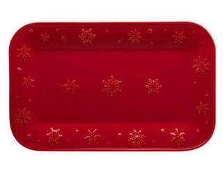 Red tray with snowflake patterns on a white background