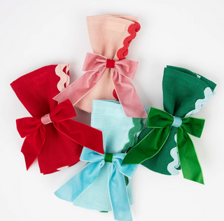 Set of colorful fabric bows on a white background