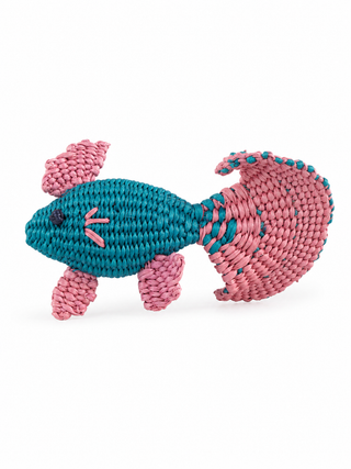 Pink and blue fish-shaped napkin ring on a white background