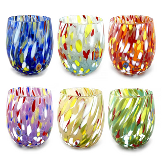 Set of six colorful glass tumblers with abstract patterns on a white background