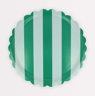 Decorative tray with green and white striped pattern on a white background