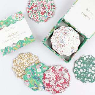 Hexagonal floral coasters with 'Liberty' branding on a white background
