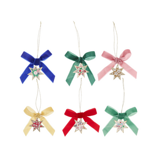 Set of colorful bow-shaped Christmas ornaments with star details on a white background