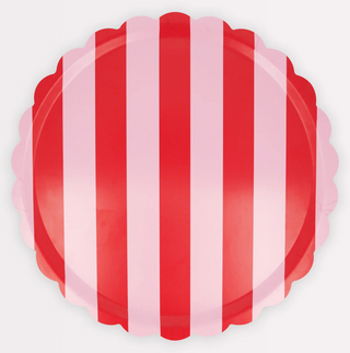 Round tray with red and pink vertical stripes on a white background